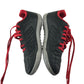 Decathlon football boots shoe size UK 10.5 junior black and red artificial grass