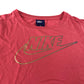 Nike t-shirt 10-11  years pink with large gold logo cropped