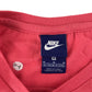 Nike t-shirt 10-11  years pink with large gold logo cropped