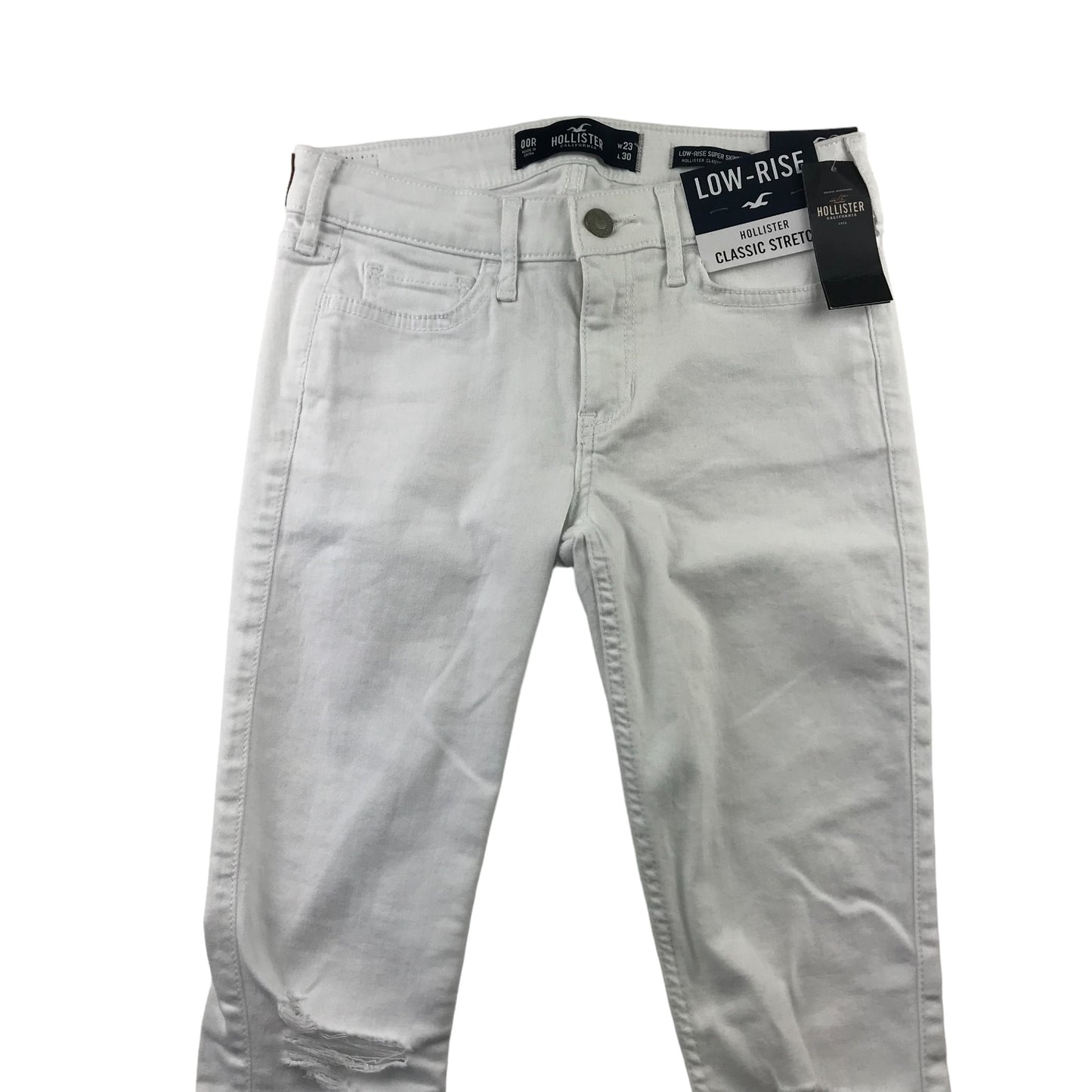 Hollister jeans W23 L30 11-12 years long white low rise long leg stretchy with worn effect