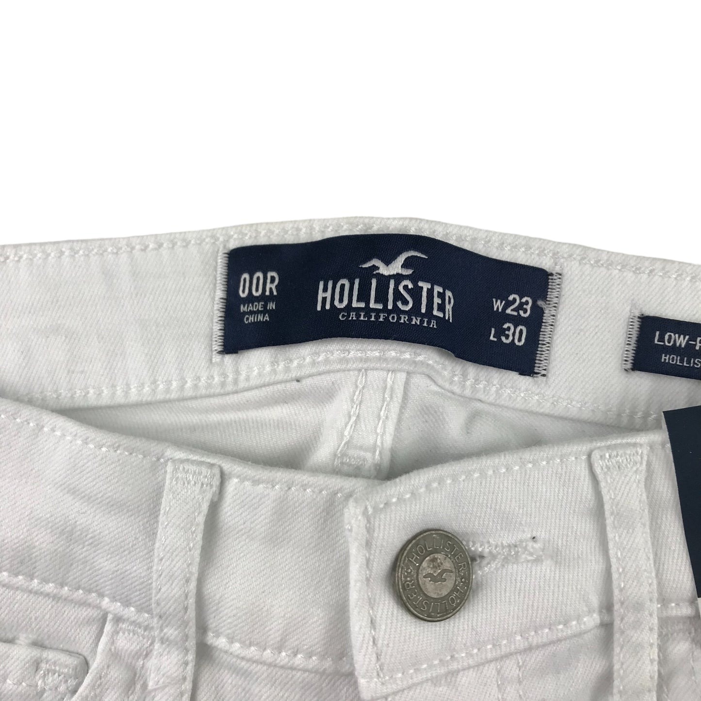 Hollister jeans W23 L30 11-12 years long white low rise long leg stretchy with worn effect