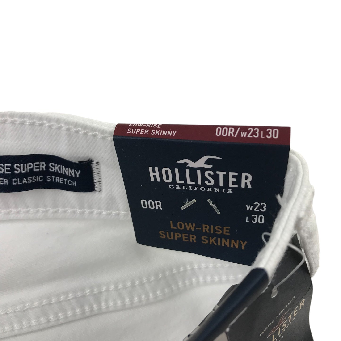 Hollister jeans W23 L30 11-12 years long white low rise long leg stretchy with worn effect