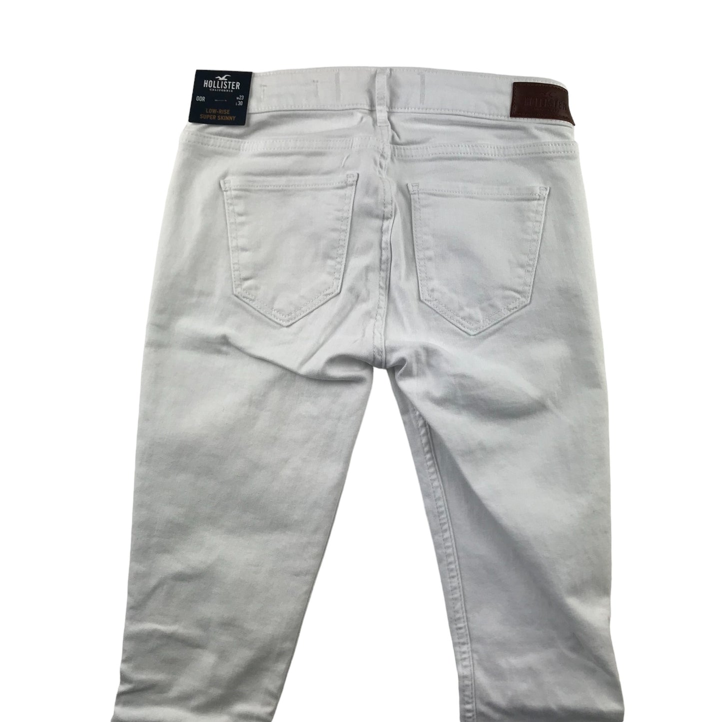 Hollister jeans W23 L30 11-12 years long white low rise long leg stretchy with worn effect