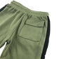 M&S shorts 7-8 years khaki with black strip both sides jersey material