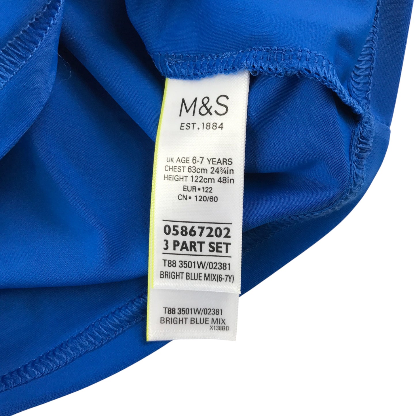 M&S swim top 6-7 years blue shark graphic design with fin popping out rash uv