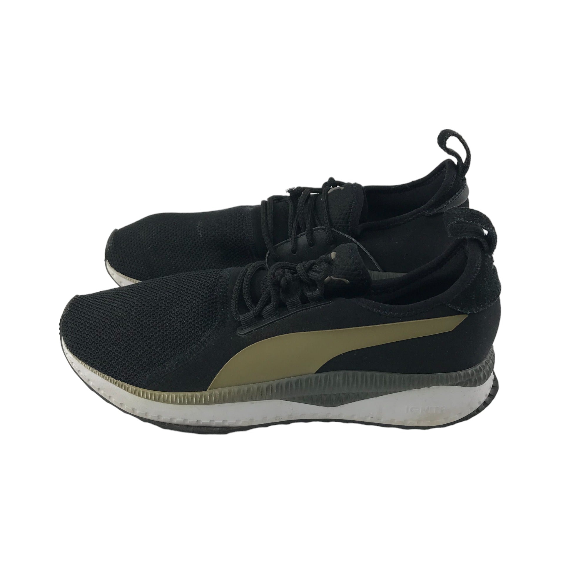 Black and gold pumas nike best sale