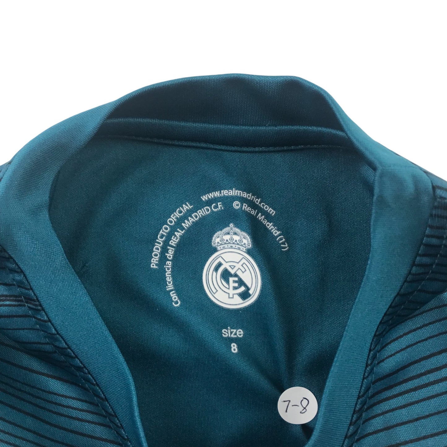 Real Madrid football strip 7-8 years teal blue short sleeve top