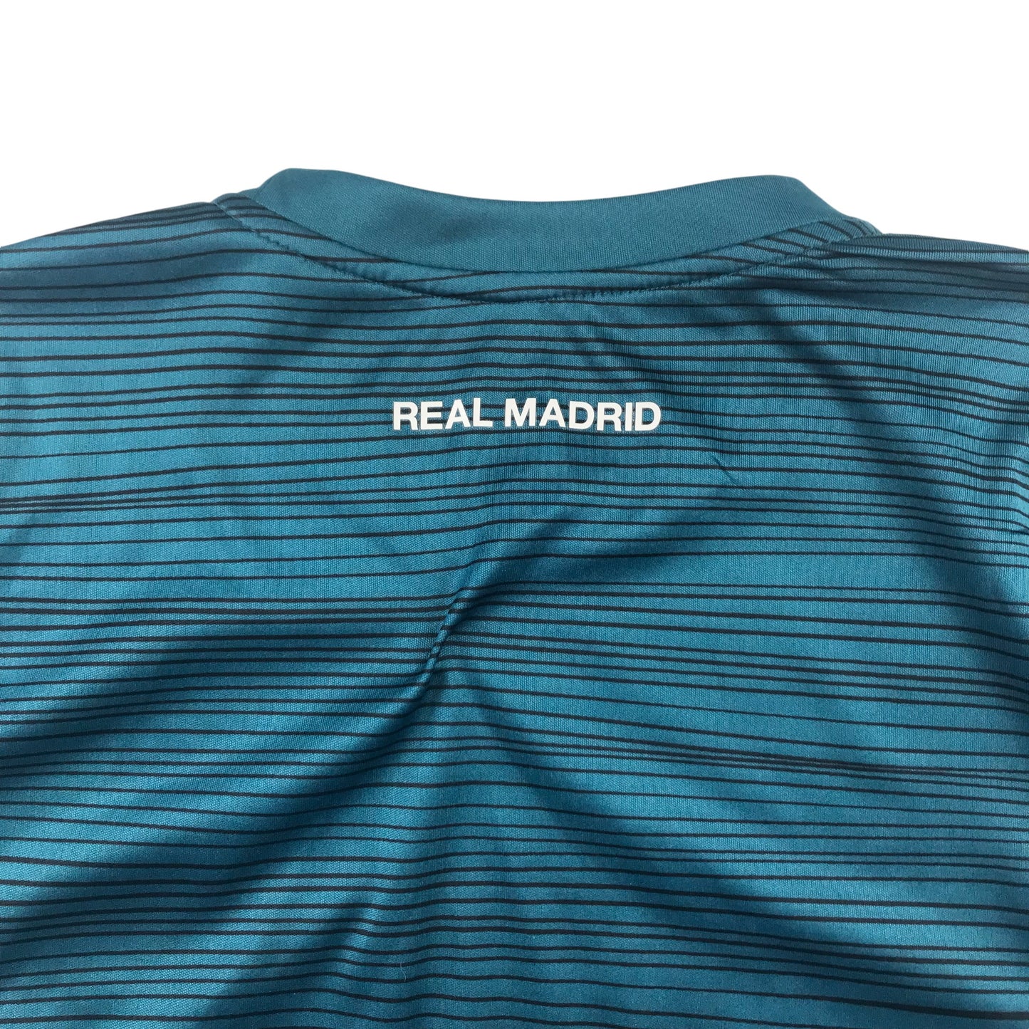 Real Madrid football strip 7-8 years teal blue short sleeve top