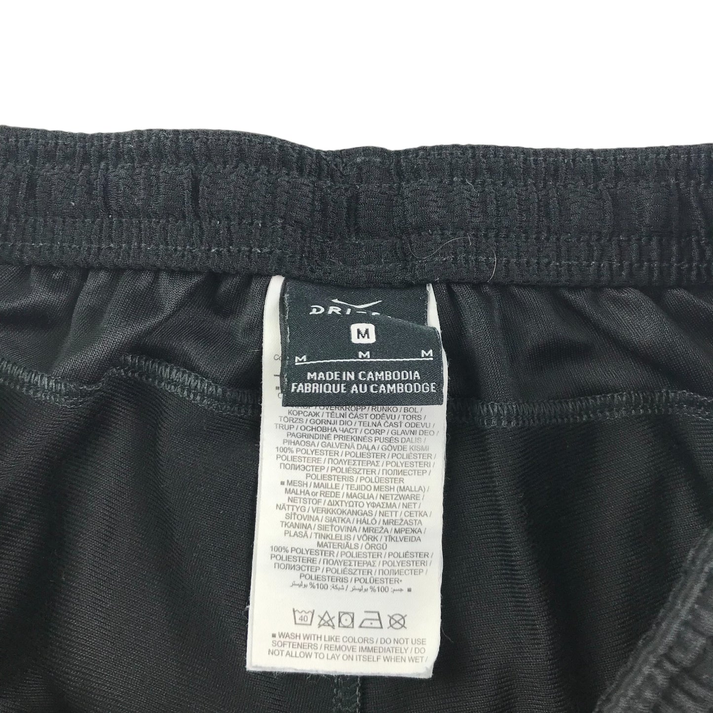 Nike sport joggers adult size M black panelled design slim leg