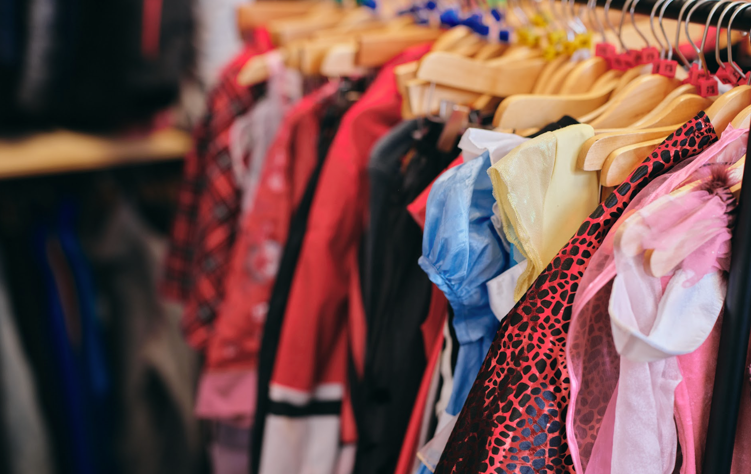 Secondhand kids clothes on a rail