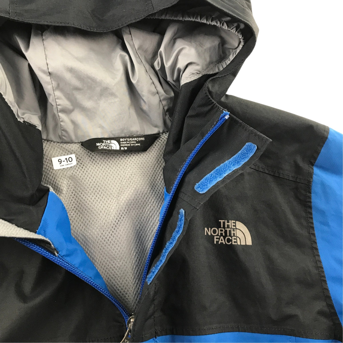 The North Face 9-10 years blue and black light jacket waterproof polyester