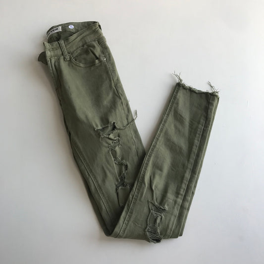 Long Khaki green skinny trousers with ripped details Age 9