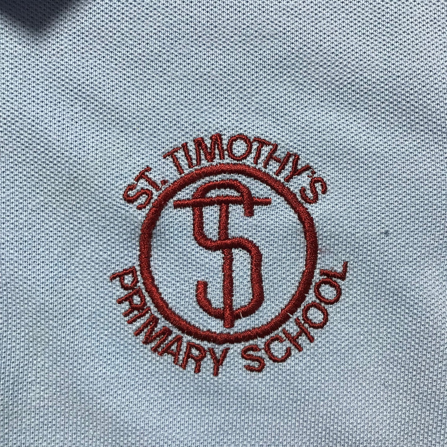 St. Timothy's Primary Light Blue Polo Shirt