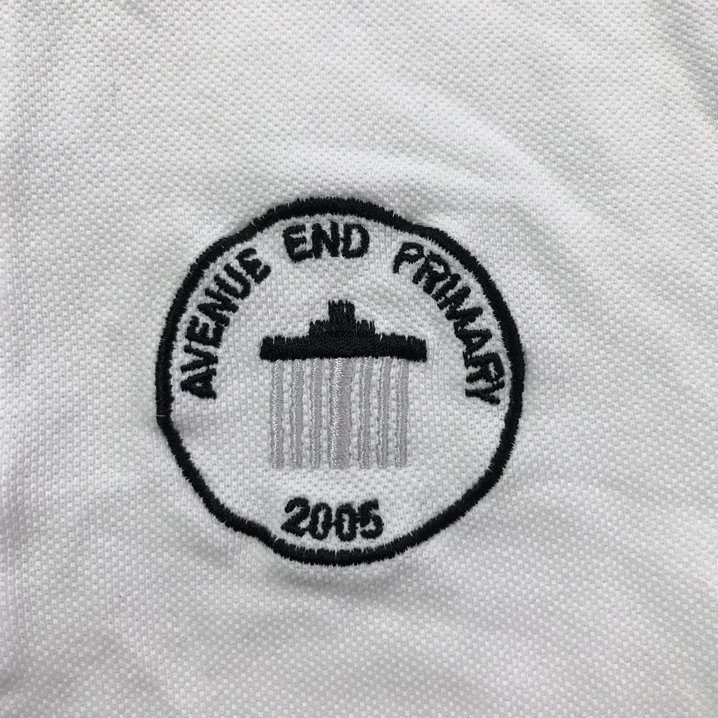 Avenue End Primary White Polo Shirt with Black Logo