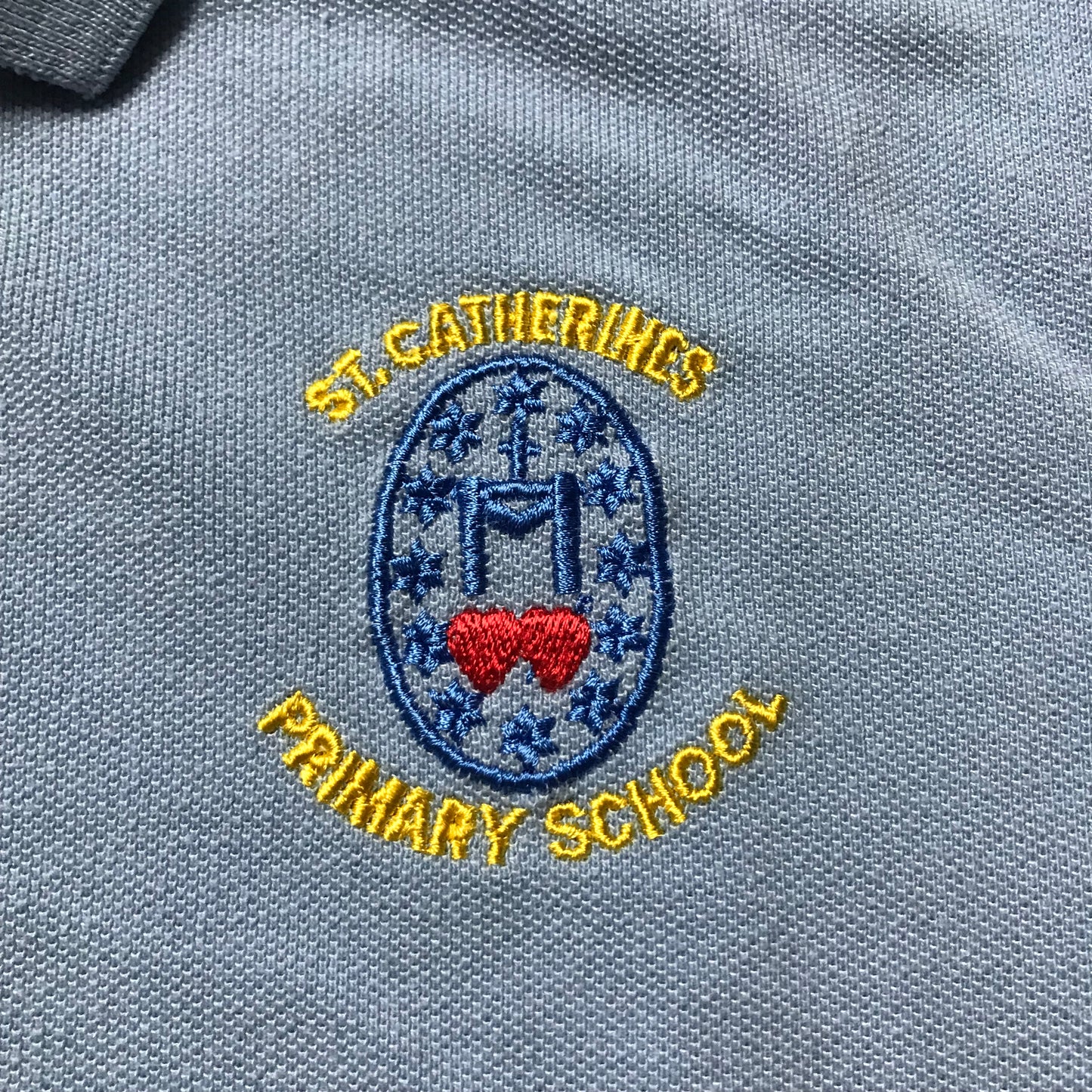 St. Catherine's Primary Light Blue Polo Shirt